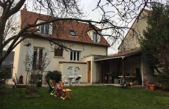 Maison côté jardin avec sa terrasse couverte avant travaux